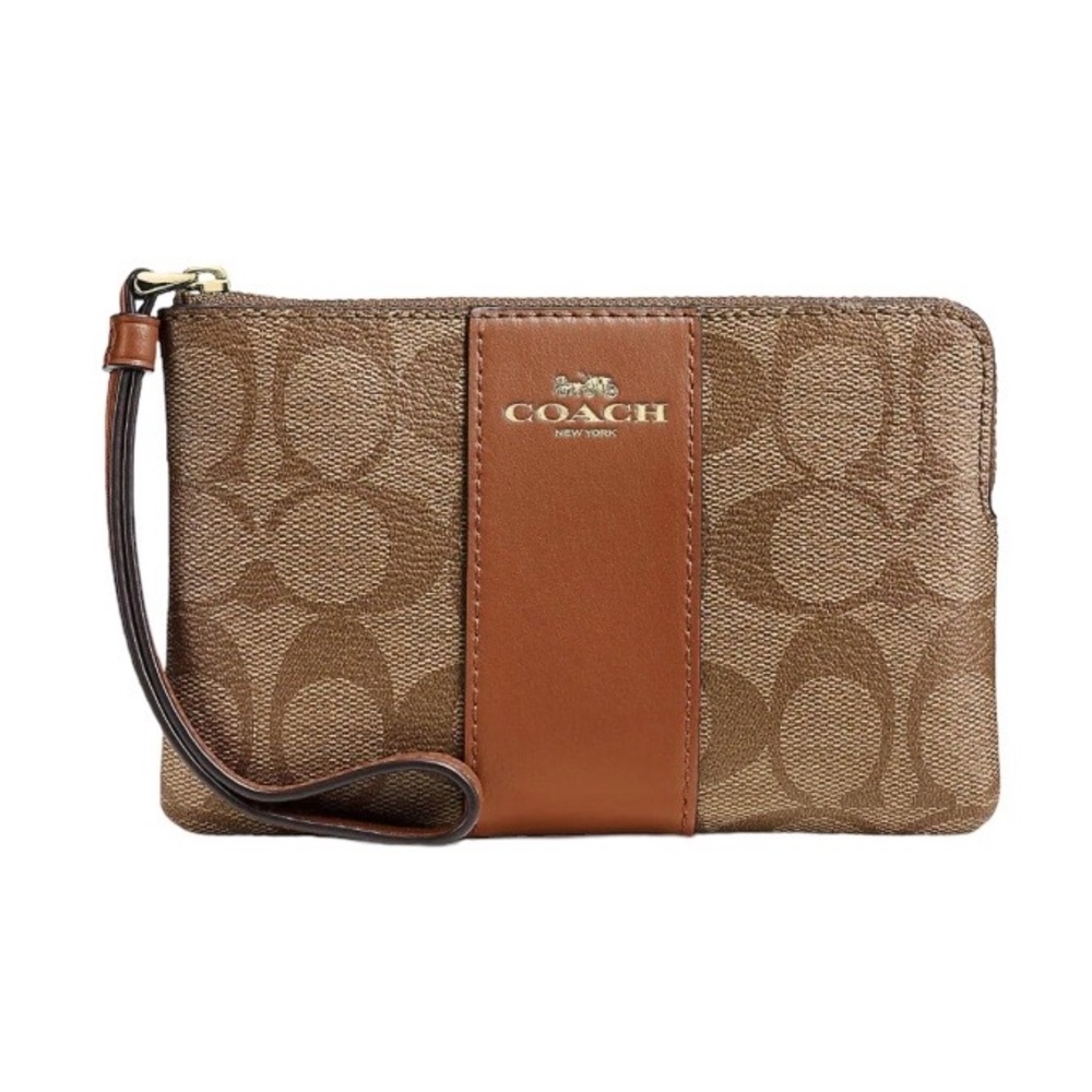 COACH Corner Zip Wristlet In Signature Canvas
In Gold/Khaki Saddle